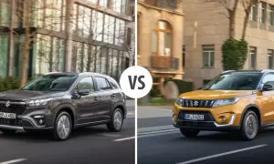 Szary i żółty suzuki suv jadące po ulicach miasta.