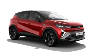 Czerwony Renault Captur z czarnym dachem, nowoczesnym designem i felgami. Wiele pozytywnych renault captur opinie o tym modelu.