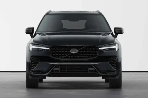 Elegancki, czarny Volvo XC60 Black Edition z charakterystycznym grillem i światłami LED.