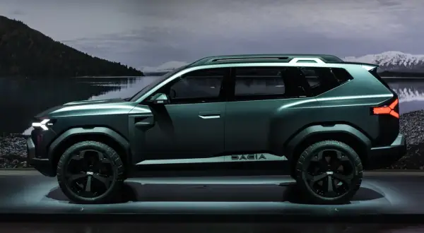 Nowy, futurystyczny dacia suv w ciemnym kolorze, gotowy na przygodę.
