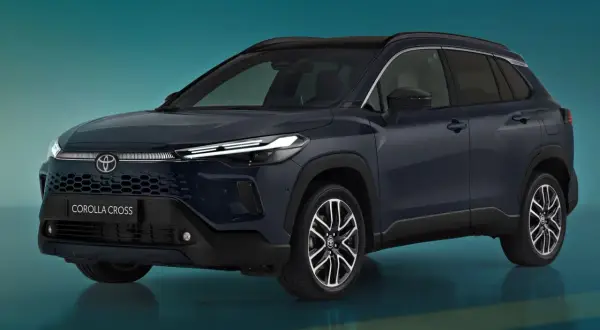 Ciemnogranatowy Toyota Corolla Cross prezentuje nowoczesny design. Sprawdź aktualną toyota corolla cross cena i dostępne wersje.