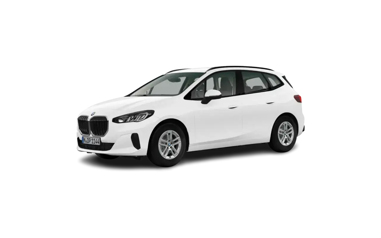 Biały BMW 2 Active Tourer stoi na czarnym tle. Elegancki samochód rodzinny z charakterystycznym grillem.