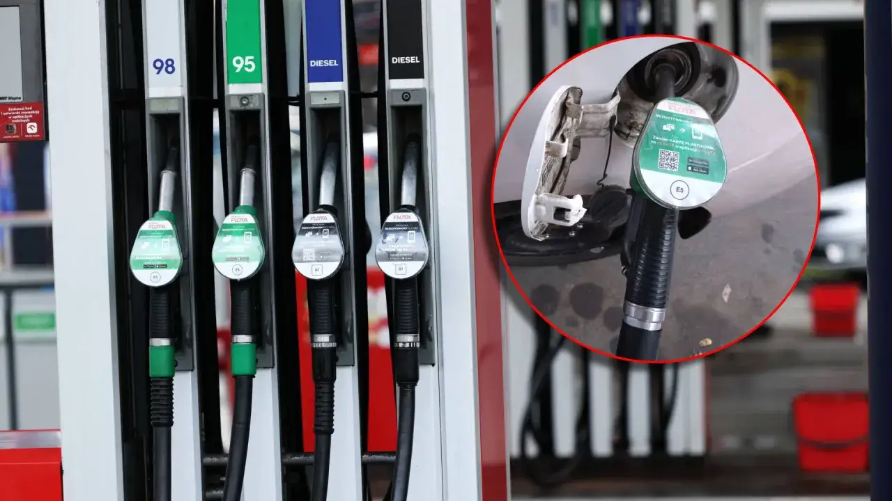 Dostępne paliwa: 98, 95, Diesel. W tle widać dystrybutor z wężem do tankowania, gdzie cena benzyny 98 jest widoczna.